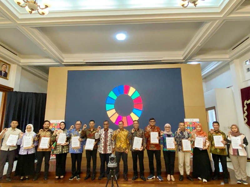 Kepala Bappedalitbang Leonard S. Ampung Tanda Tangani PKS Proyek SDGs SSTC Phase II